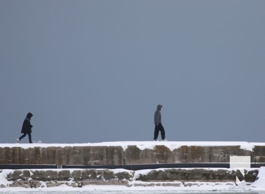 January 12, 2025 Youths on Frozen Pier Cobourg Harbour 102