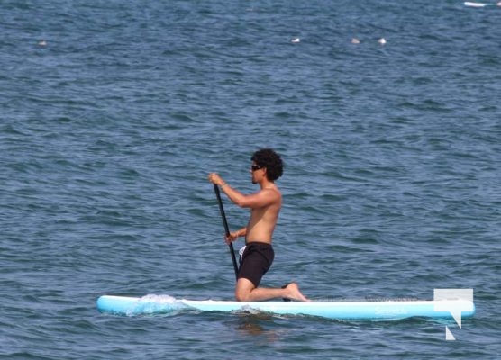 August 2, 2025 life jackets paddle board beach5482