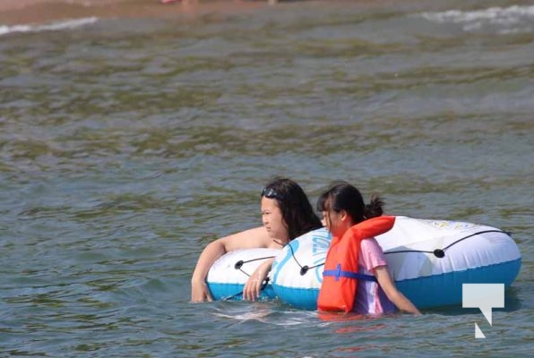 August 2, 2025 life jackets paddle board beach5483