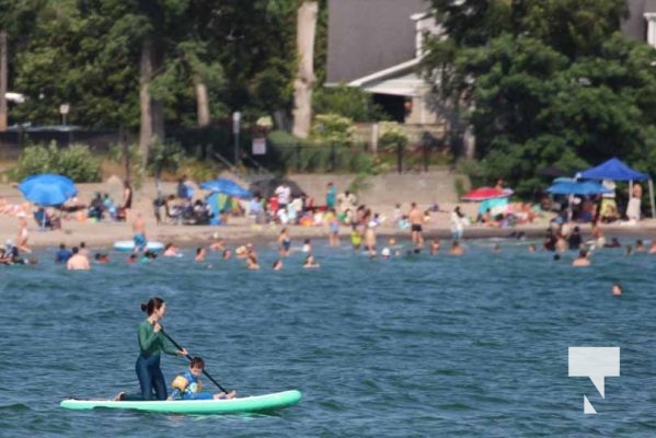 August 2, 2025 life jackets paddle board beach5484